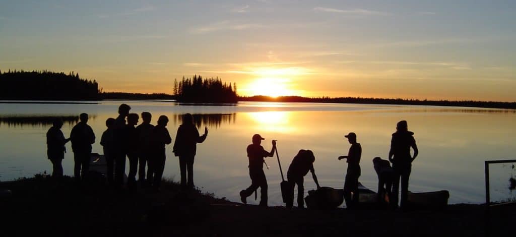 surprise lake camp silhouette people lakeside